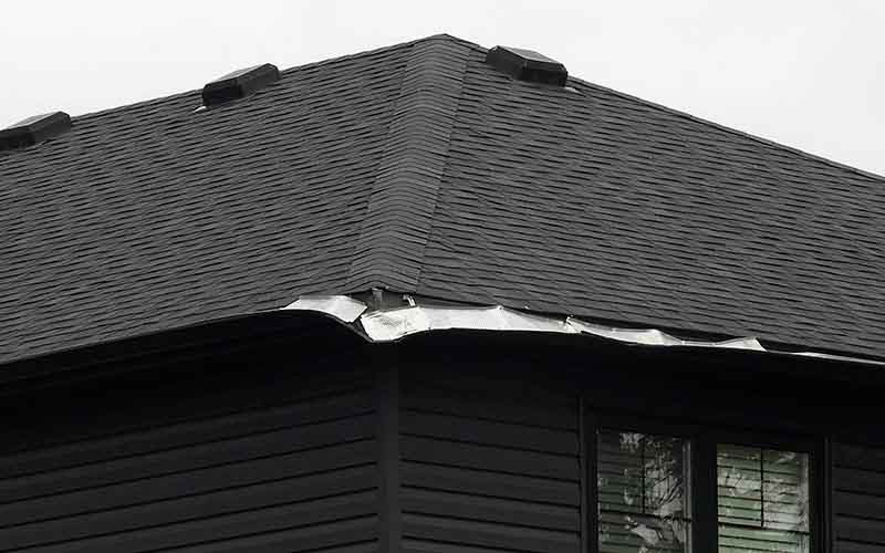 This is the eavestrough to a neighbour behind our studio, yet he has received no citation.