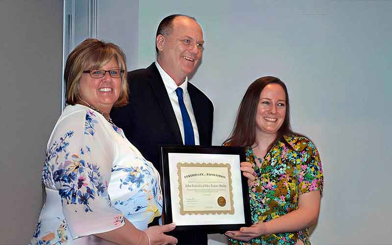 Presentation of our award from the Women and Children's Shelter.
