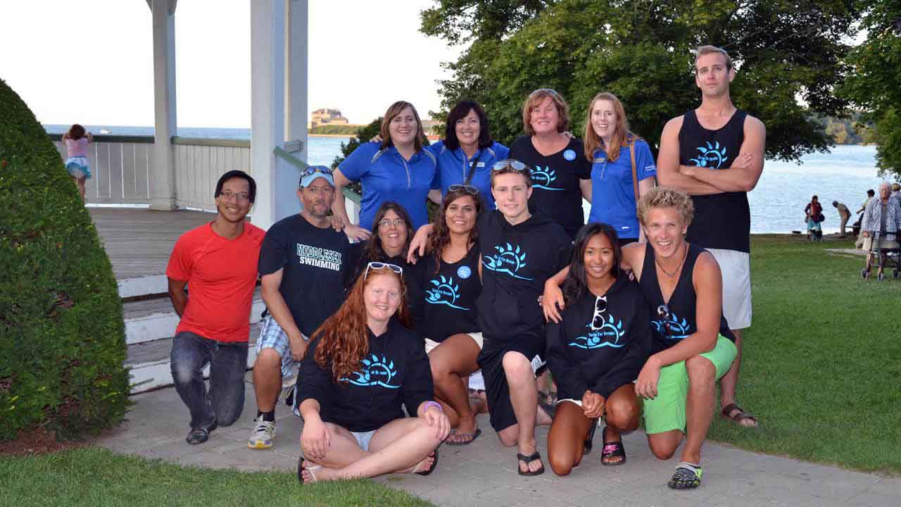 Ashleigh Beacham with her family, team, supporters, and Make A Wish benefactors