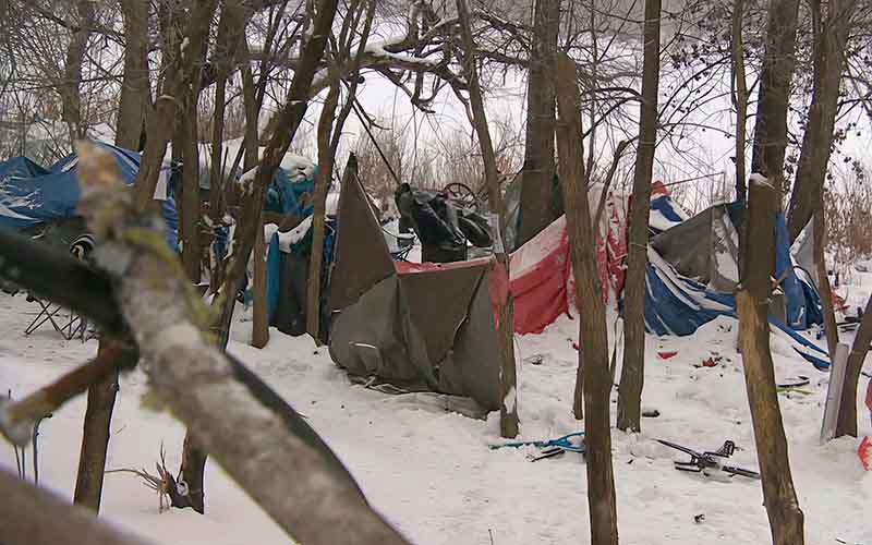 Forest encampments provide security. There is no reason to evict them.