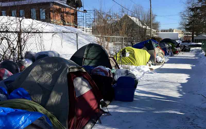 It is possible for encampments and pedestrians to coexist.